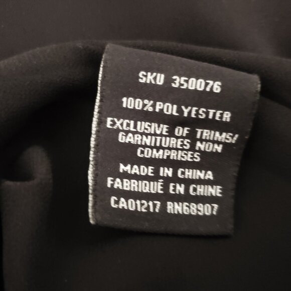 Sexy Black Sleeveless Blouse with Strappy Front Cut-Out by Le Chateau - Picture 5 of 5